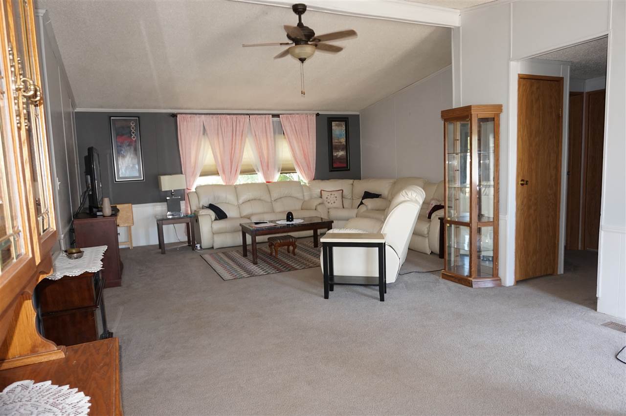 5134 Rockberry Road Loves Park, IL 61111 - Photo 12 of 24 a living room with furniture and a window