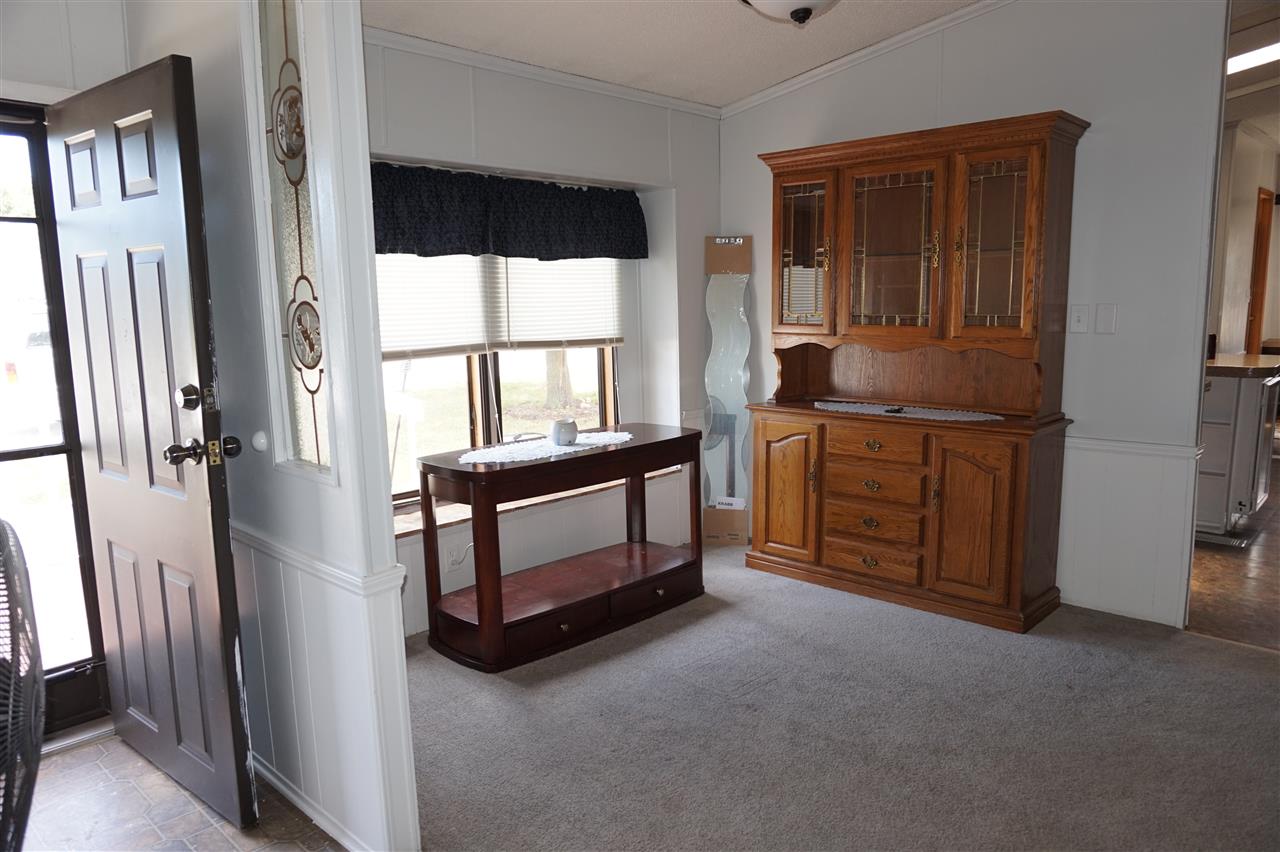 5134 Rockberry Road Loves Park, IL 61111 - Photo 13 of 24 a room with closet and furniture