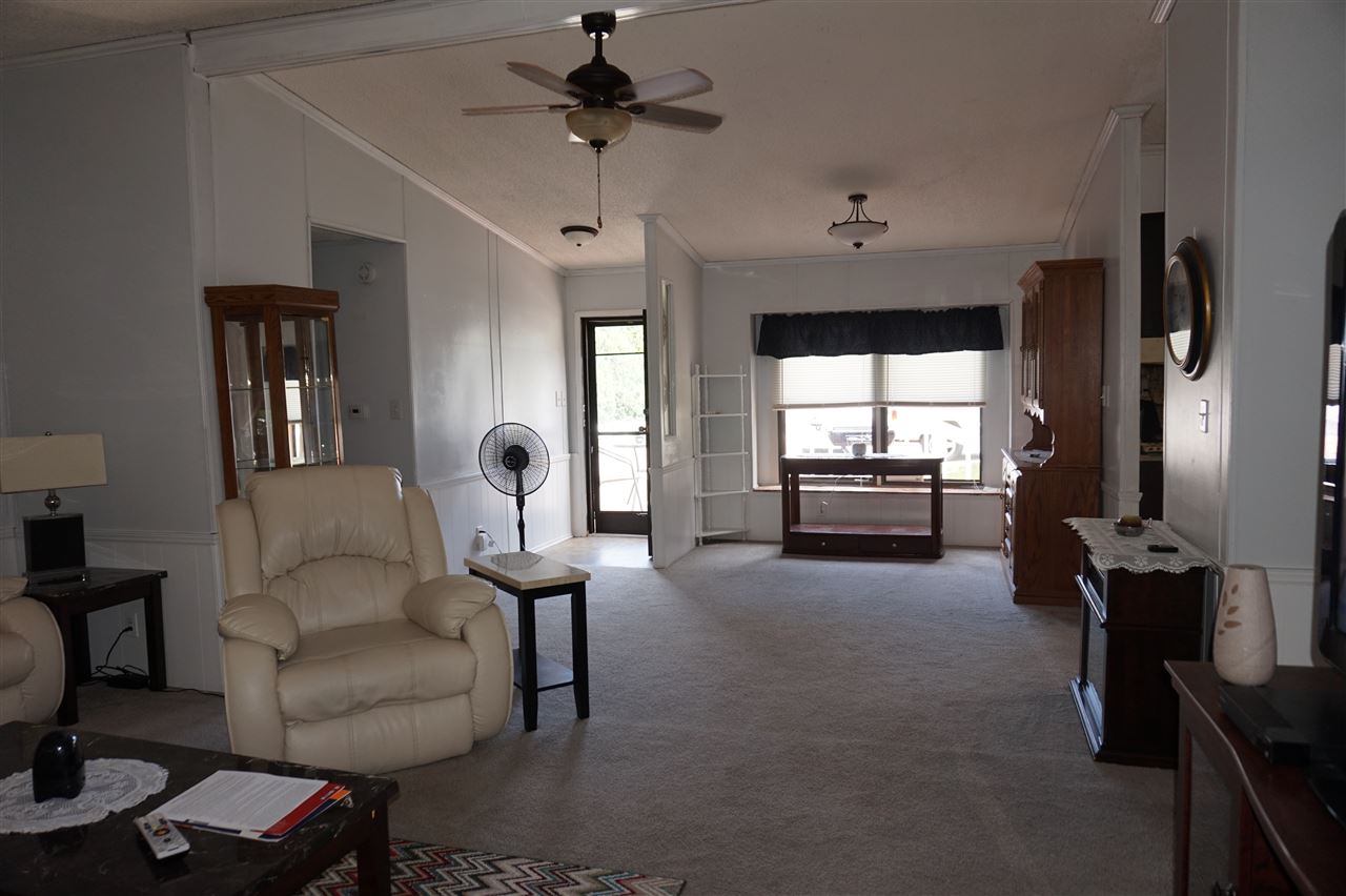 5134 Rockberry Road Loves Park, IL 61111 - Photo 14 of 24 a living room with furniture and a window