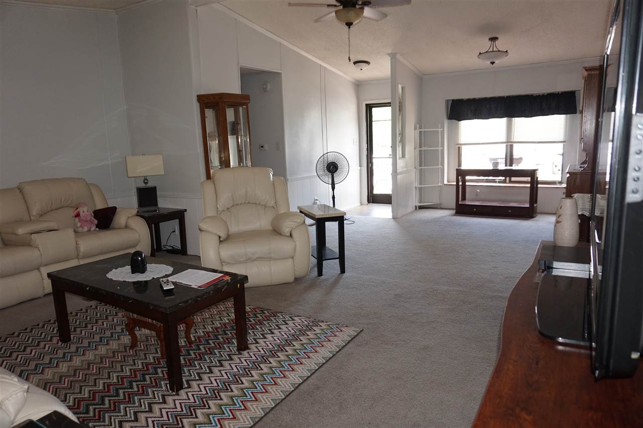 5134 Rockberry Road Loves Park, IL 61111 - Photo 15 of 24 a living room with furniture and a wooden floor