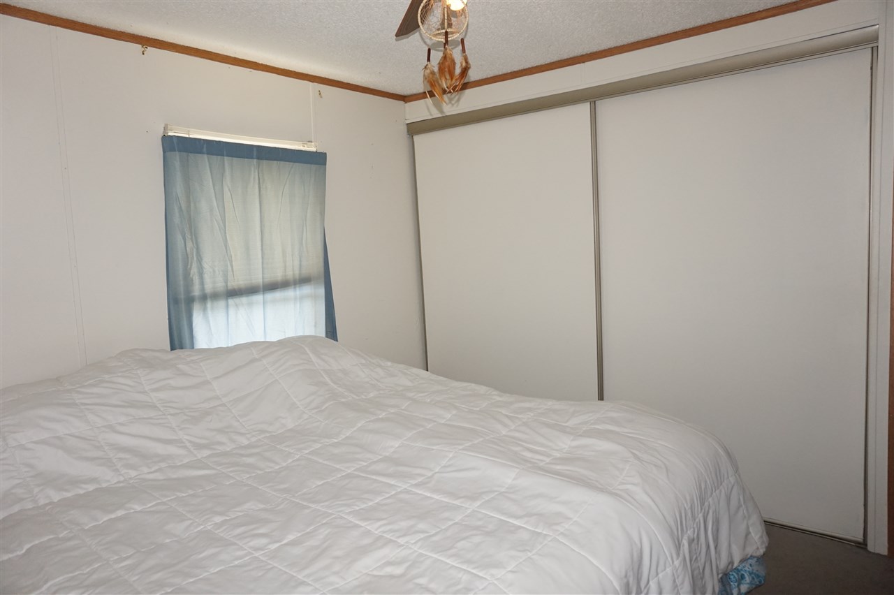 5134 Rockberry Road Loves Park, IL 61111 - Photo 23 of 24 a large white bed in a white room