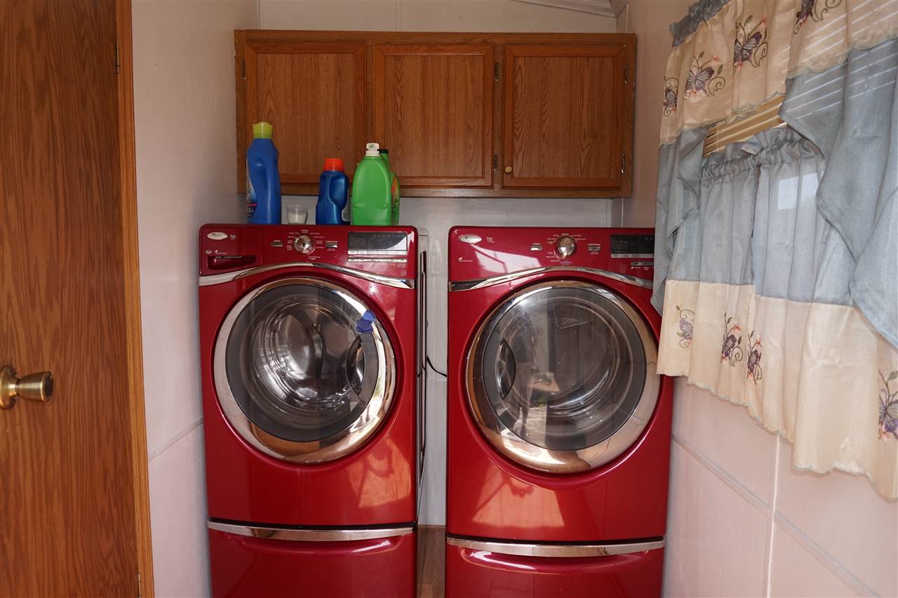 5134 Rockberry Road Loves Park, IL 61111 - Photo 9 of 24 a utility room with dryer and washer