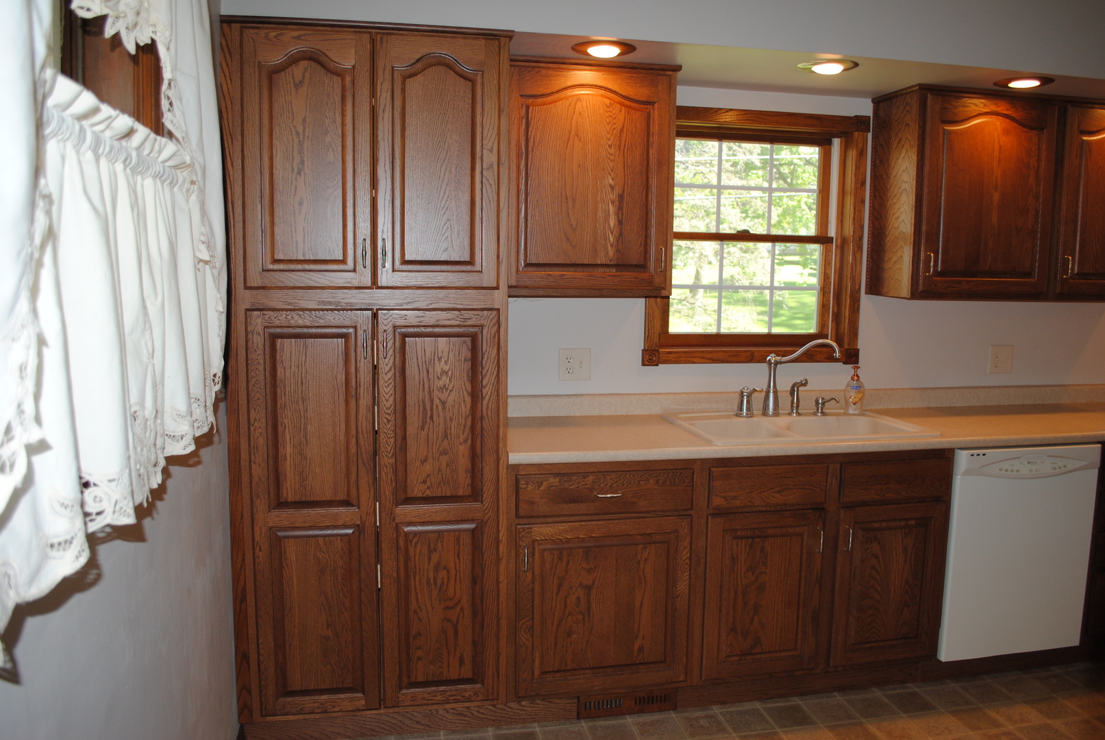 208 Ridge Street Mount Carroll, IL 61053 - Photo 4 of 16 a bathroom with a sink a mirror and a shower