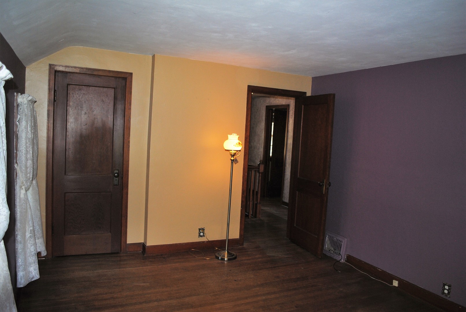 208 Ridge Street Mount Carroll, IL 61053 - Photo 8 of 16 an empty room with wooden floor and closet