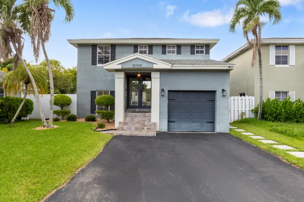$459,000 | 5799 Woodland Point Drive, Tamarac, FL 33319