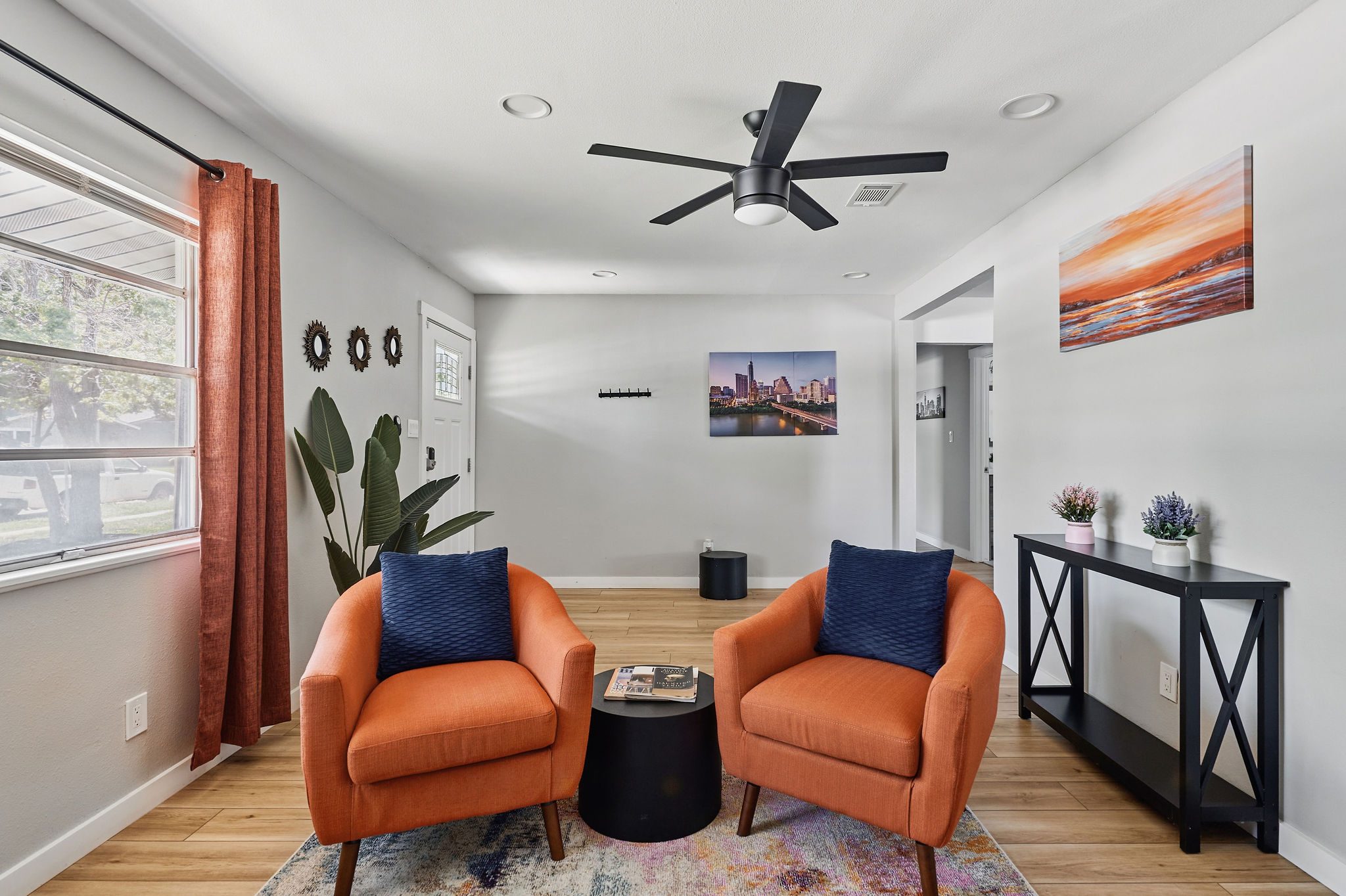 7706 Delafield Lane Austin, TX 78752 - Photo 14 of 28 Living area with light wood-type flooring, a ceiling fan, and recessed lighting