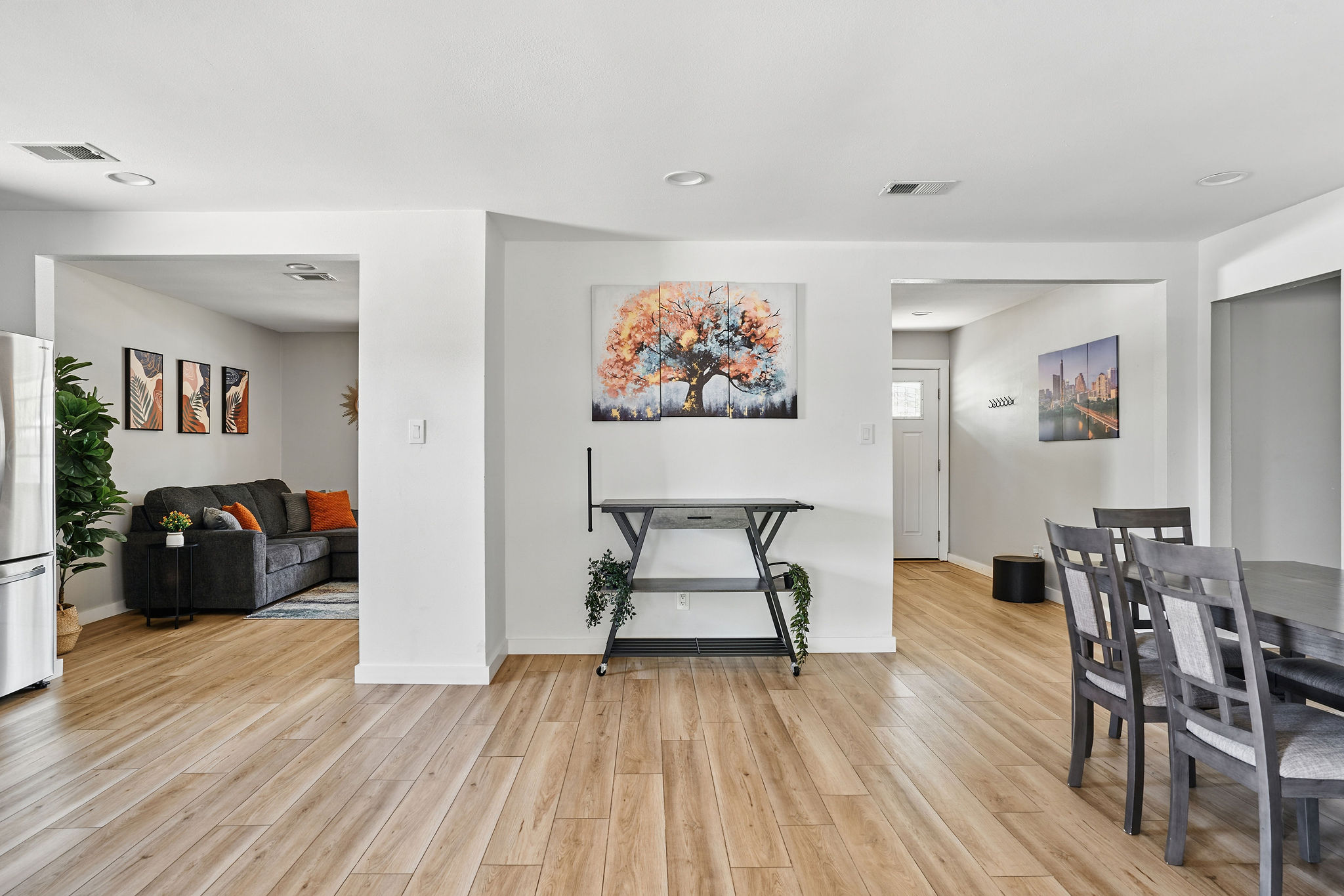 7706 Delafield Lane Austin, TX 78752 - Photo 16 of 28 Dining room featuring light wood finished floors and recessed lighting