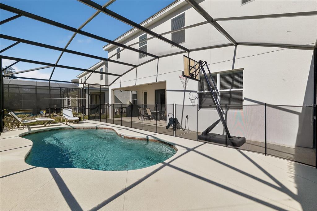 4577 Cabello Loop Kissimmee, FL 34746 - Photo 5 of 37 a view of a swimming pool with a patio