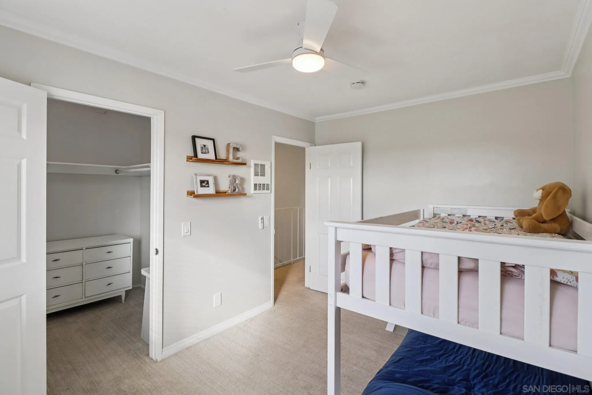 324 Countrywood Lane Encinitas, CA 92024 - Photo 15 of 42 a white bed sitting in a room next to a window