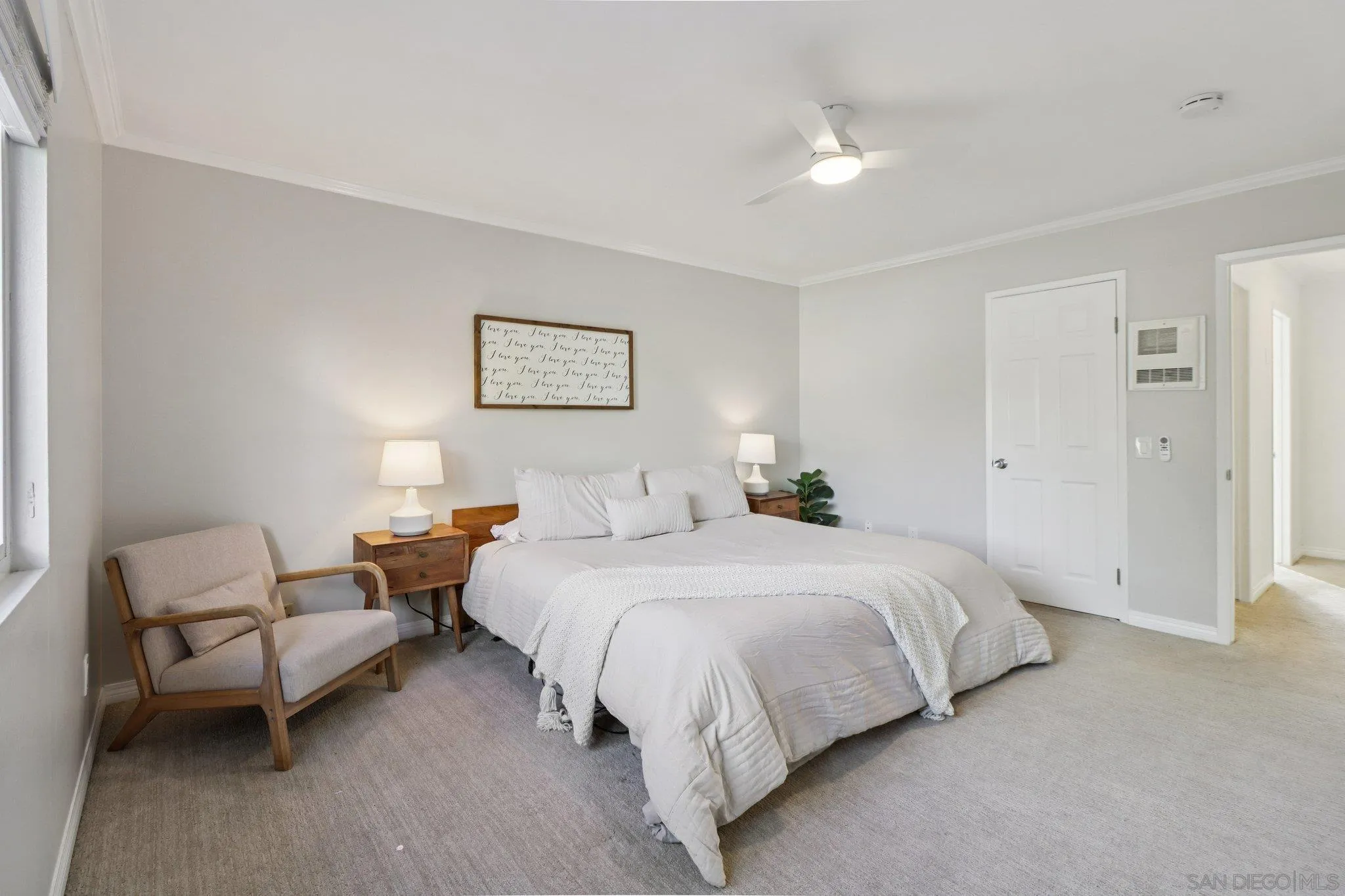 324 Countrywood Lane Encinitas, CA 92024 - Photo 18 of 42 a bedroom with bed and a couch