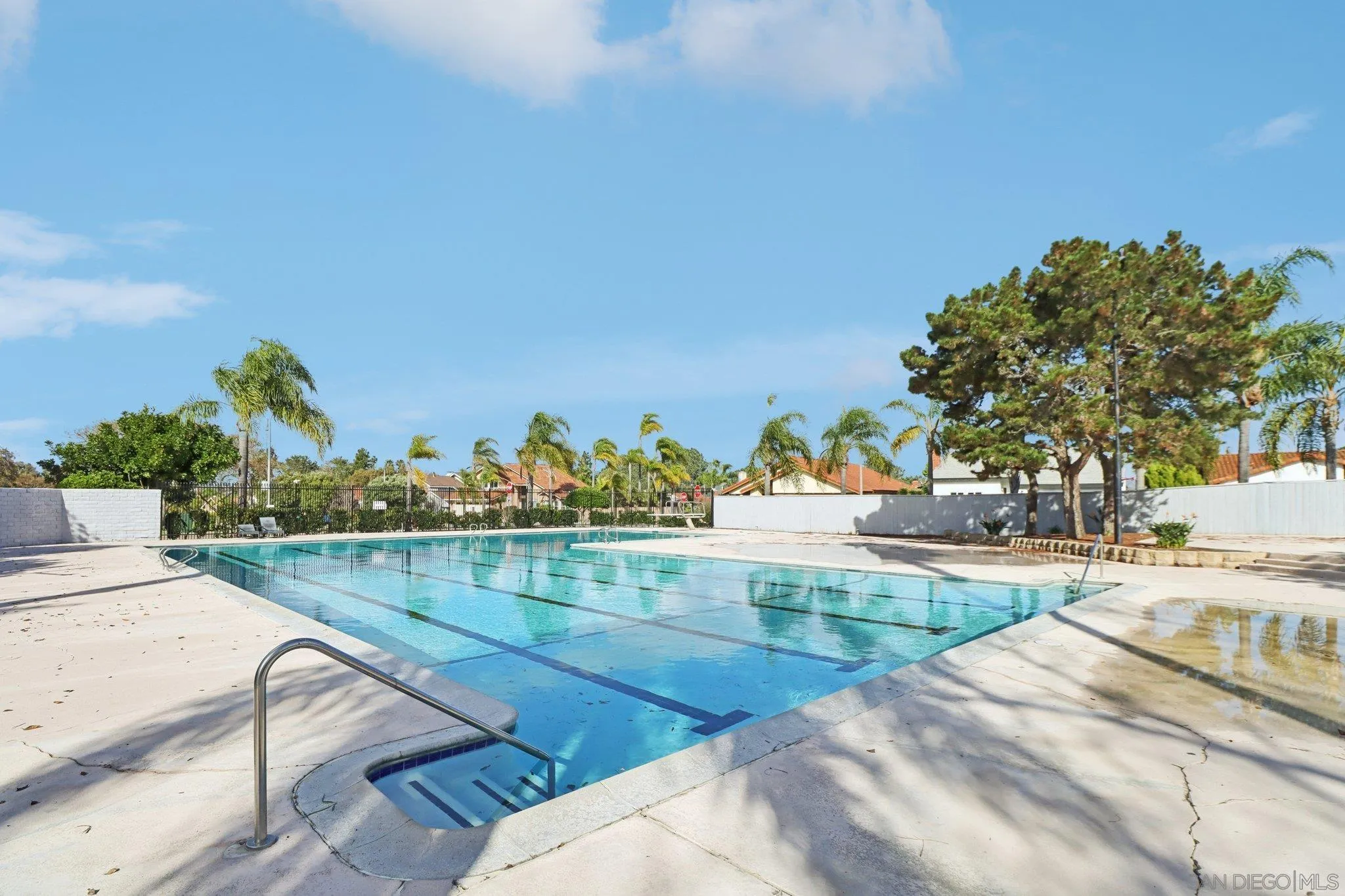 324 Countrywood Lane Encinitas, CA 92024 - Photo 31 of 42 a view of a swimming pool with a patio and a yard