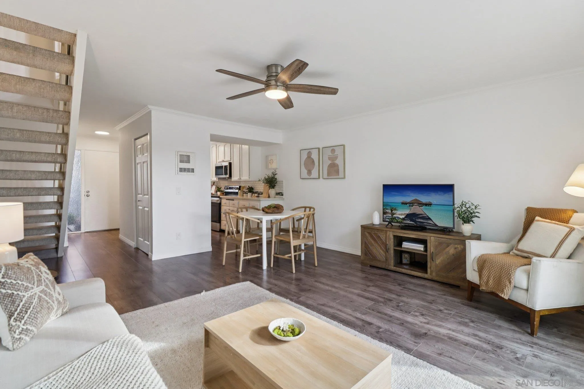 324 Countrywood Lane Encinitas, CA 92024 - Photo 5 of 42 a living room with furniture a rug potted plant and a window