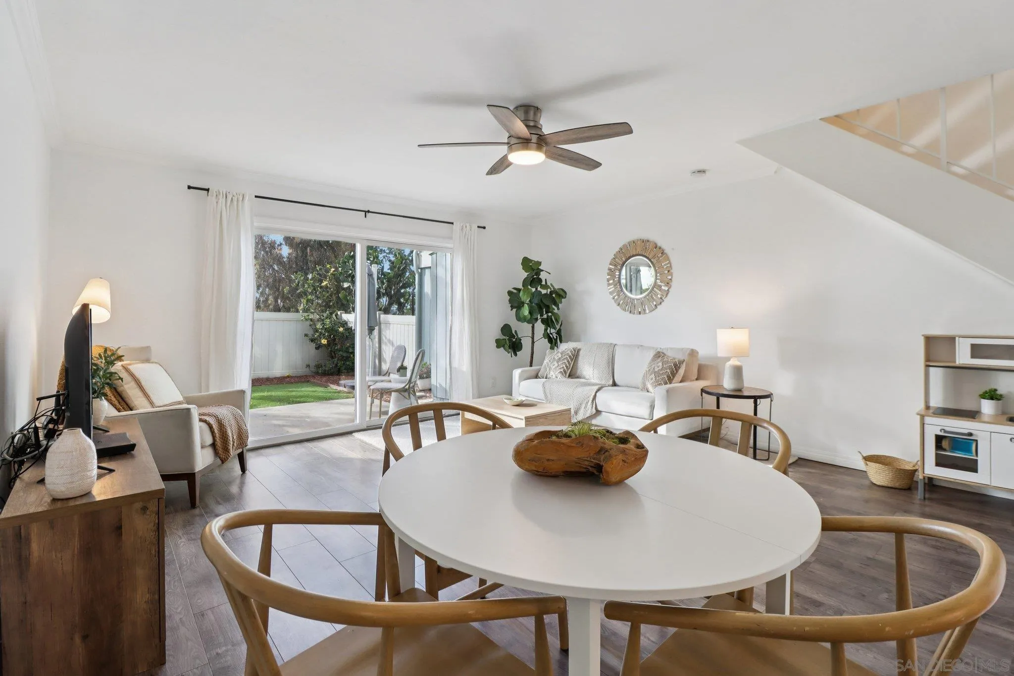 324 Countrywood Lane Encinitas, CA 92024 - Photo 7 of 42 a dining room with furniture and wooden floor