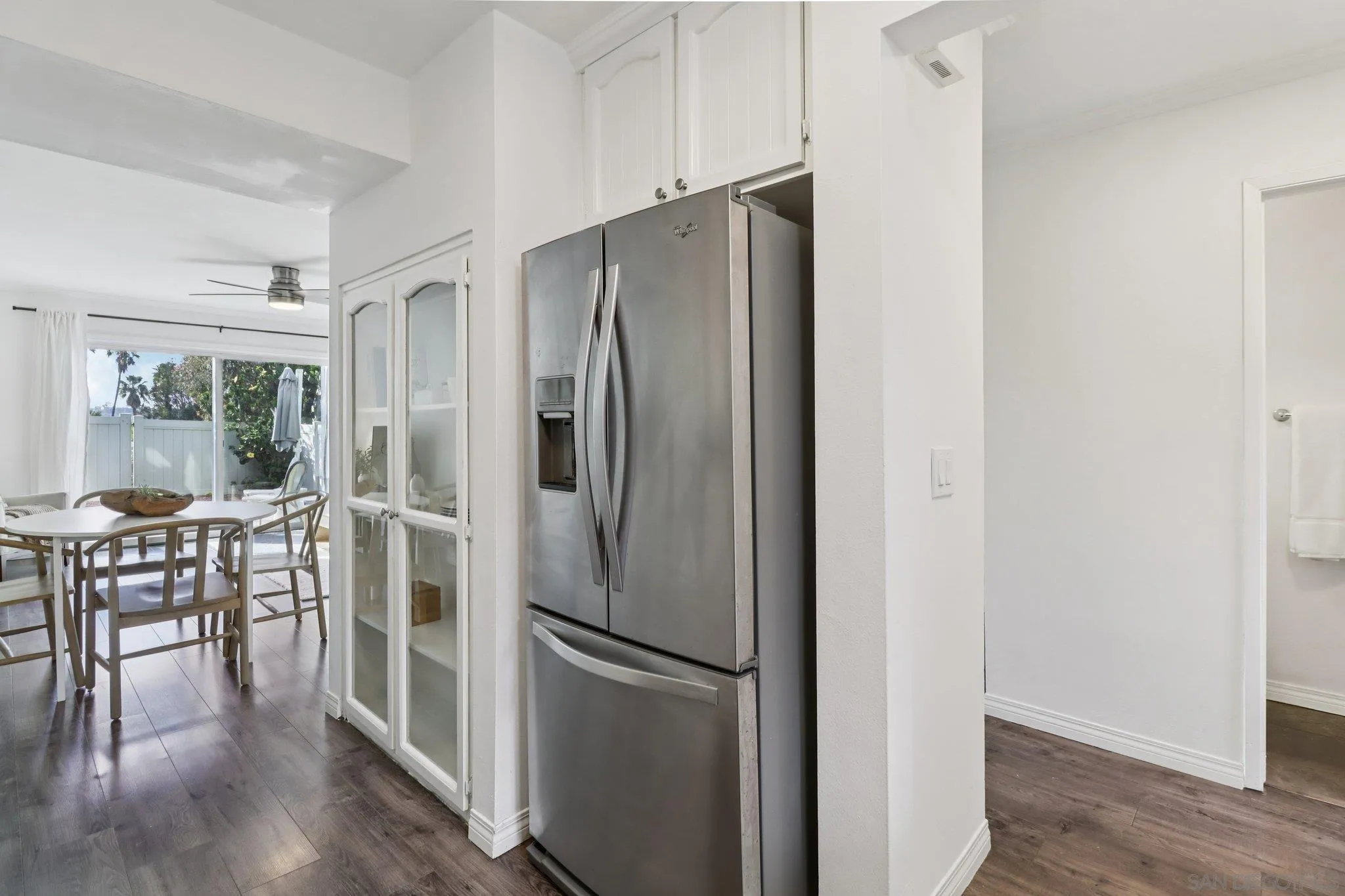 324 Countrywood Lane Encinitas, CA 92024 - Photo 9 of 42 a metallic refrigerator freezer sitting in a kitchen