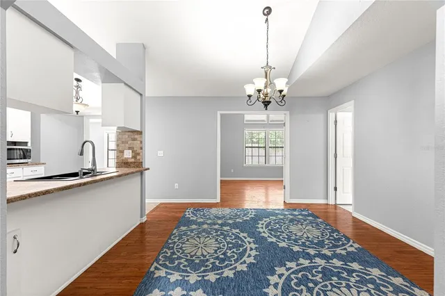 a bedroom with bed and window