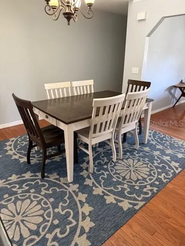 a view of a dining room with furniture