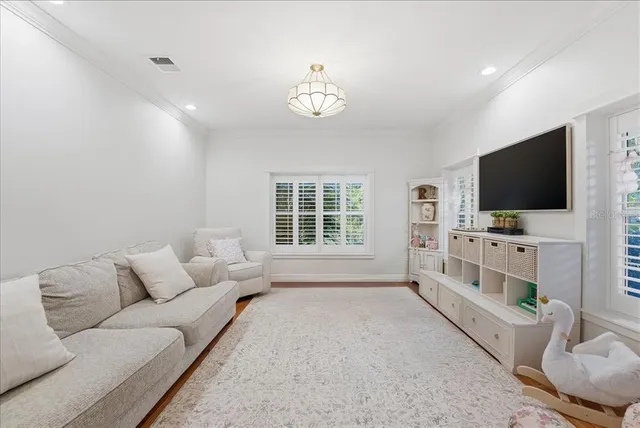 a spacious bathroom with a sink double vanity and a mirror