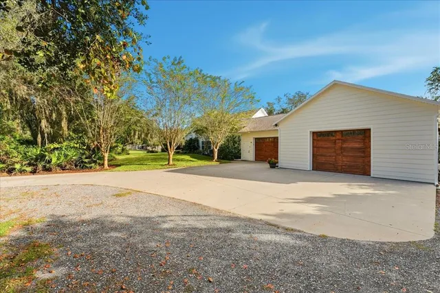 a bedroom with furniture and flat screen tv