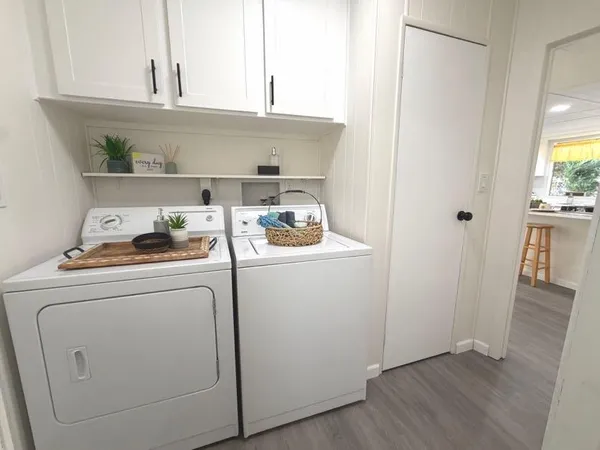 a utility room with dryer and washer