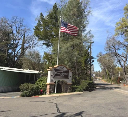 front of a building with trees