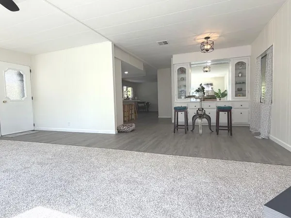 a view of a dining room with furniture