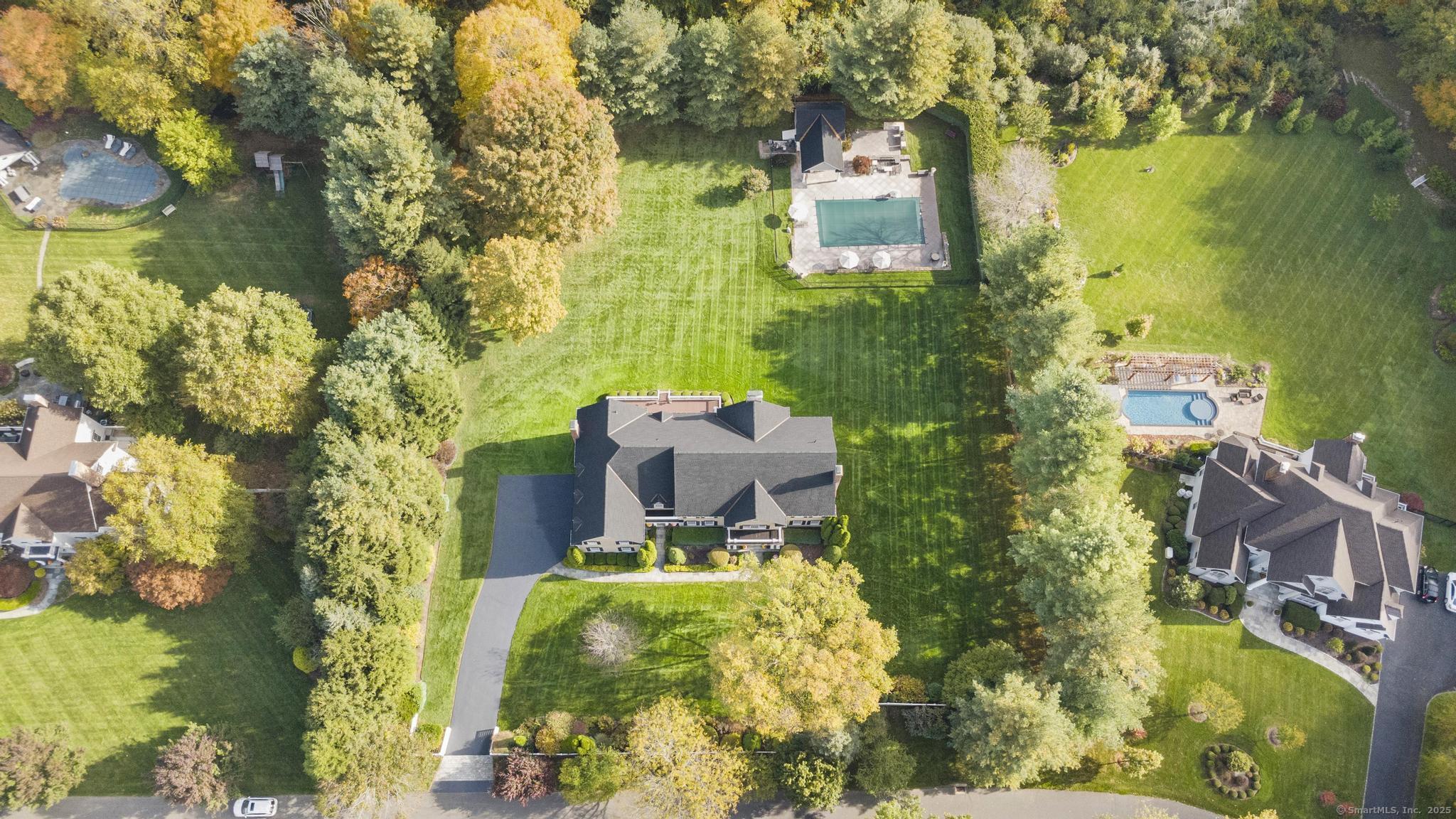 342 Midlock Road Fairfield, CT 06824 - Photo 39 of 40 view of a lake with a building in the background