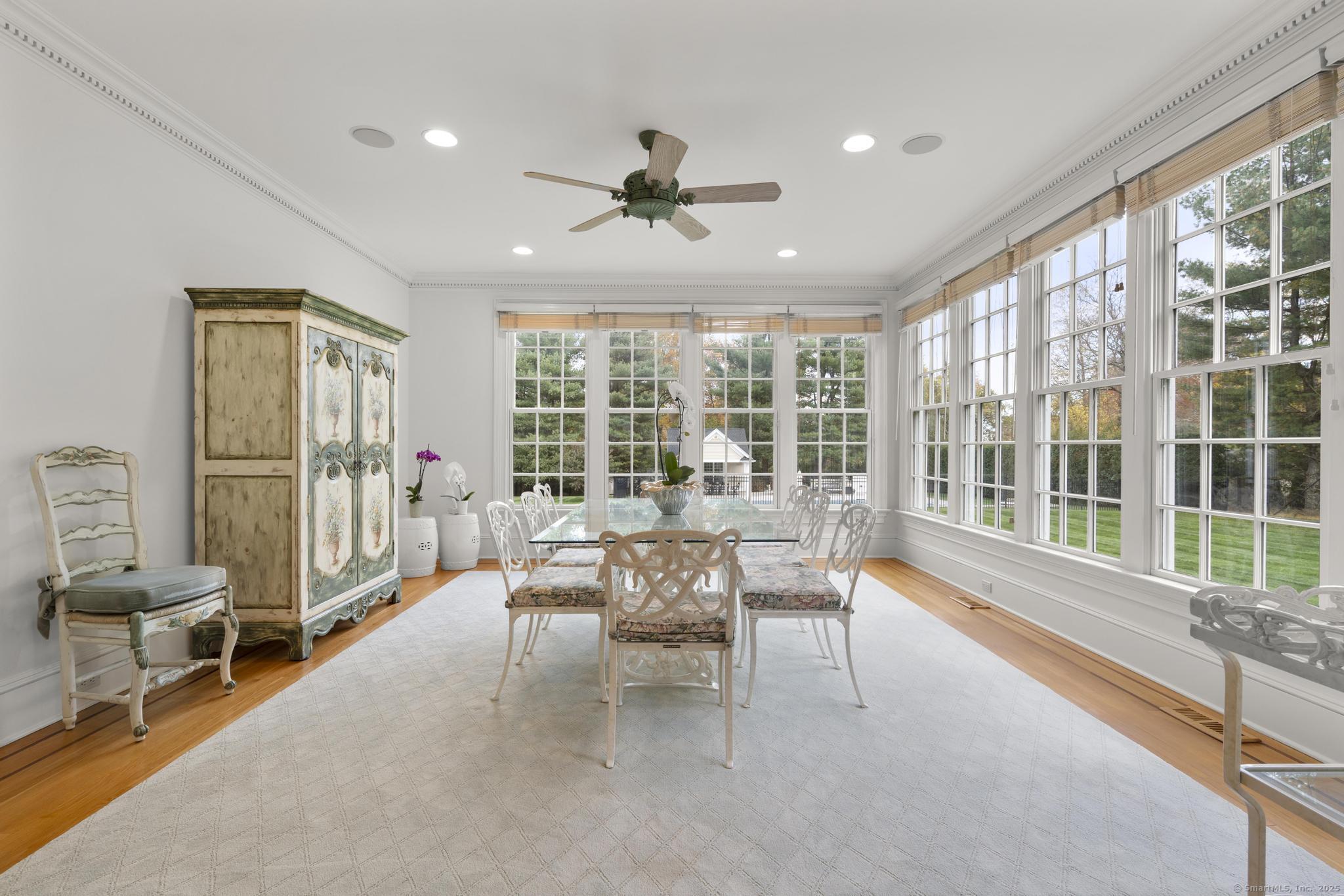 342 Midlock Road Fairfield, CT 06824 - Photo 5 of 40 a living room with furniture and a large window
