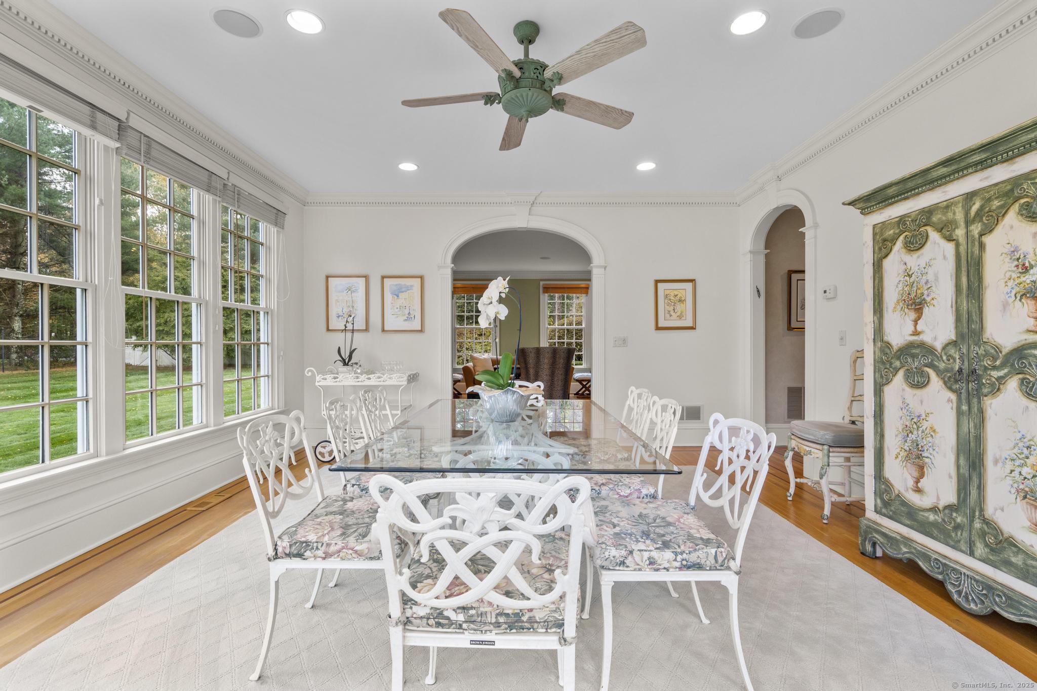 342 Midlock Road Fairfield, CT 06824 - Photo 6 of 40 a view of a dining room with furniture window and outside view