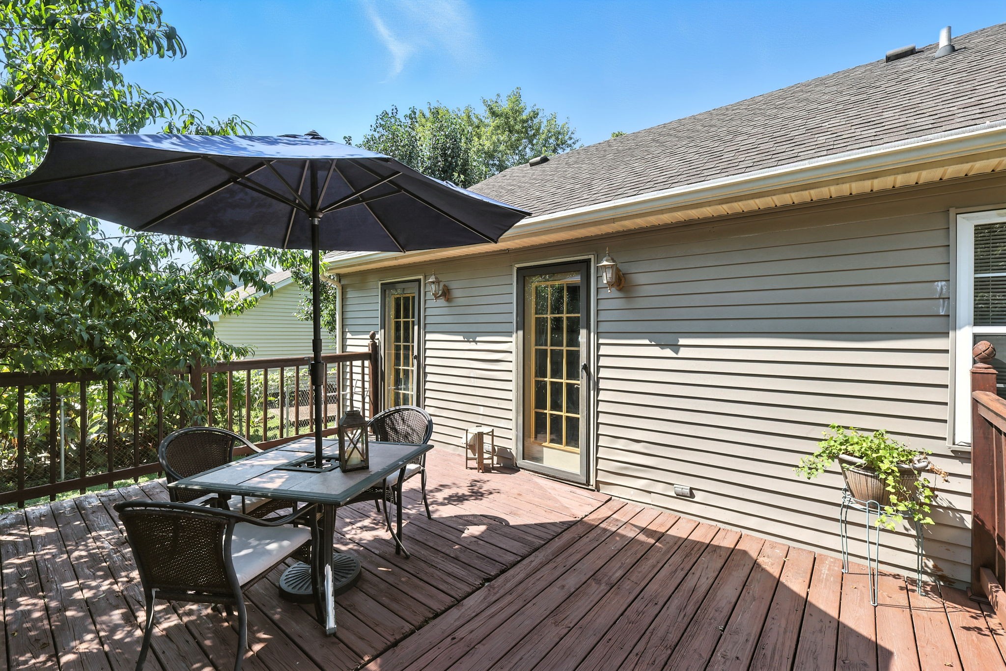 1121 Jacksons Valley Road Hermitage, TN 37076 - Photo 13 of 38 a backyard of a house with table and chairs