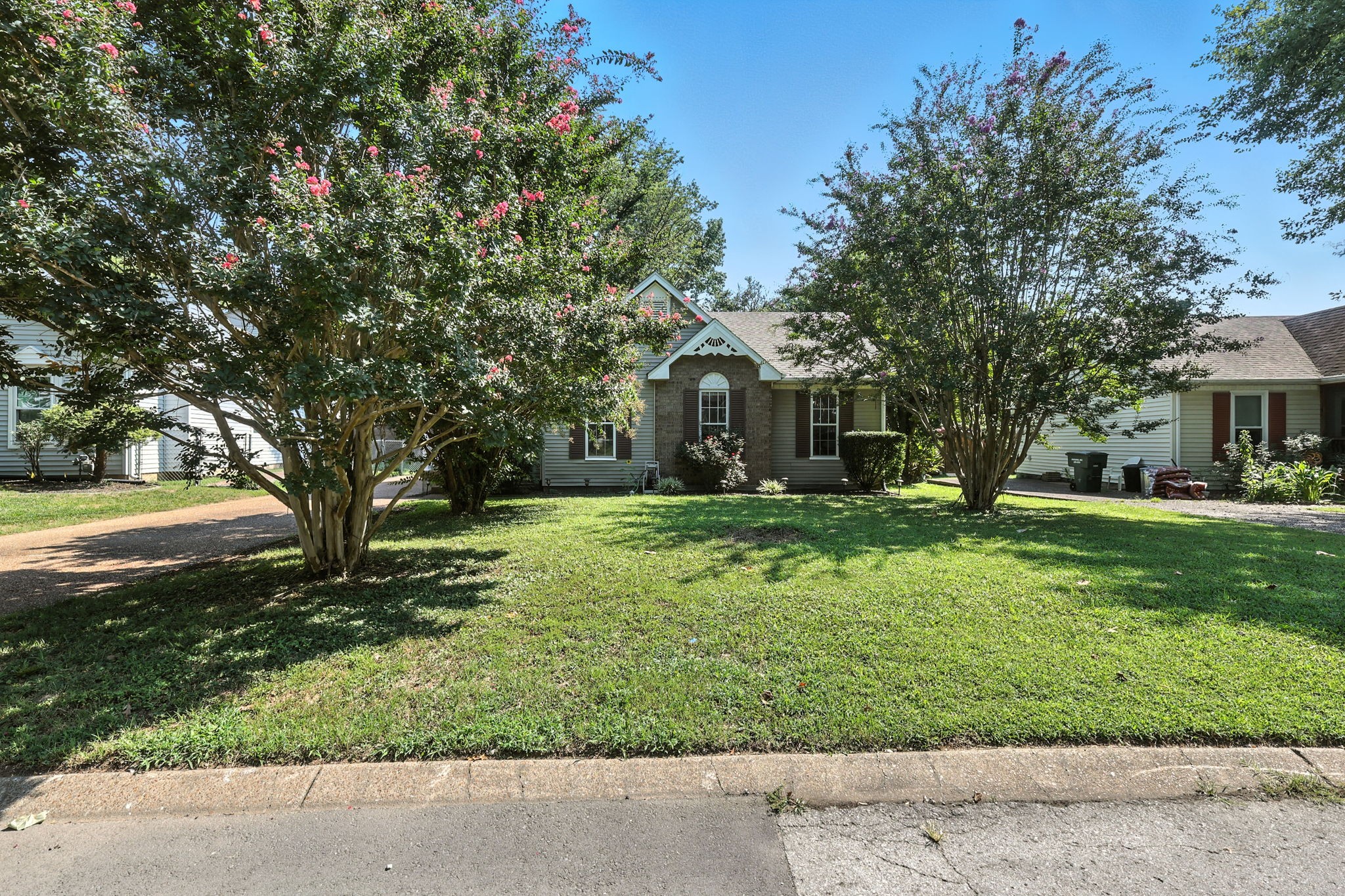 1121 Jacksons Valley Road Hermitage, TN 37076 - Photo 16 of 38 a front view of a house with a yard
