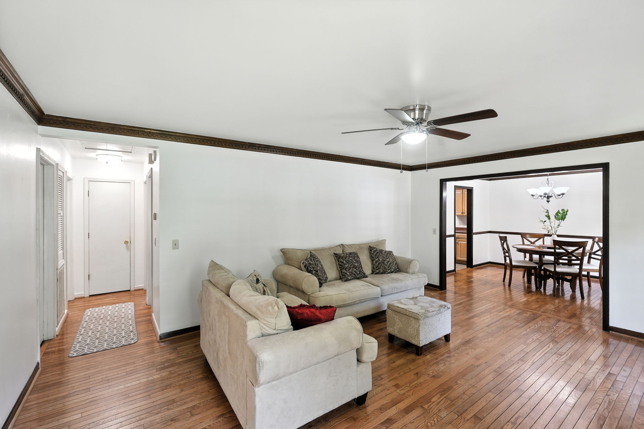 1121 Jacksons Valley Road Hermitage, TN 37076 - Photo 17 of 38 a living room with furniture and a wooden floor