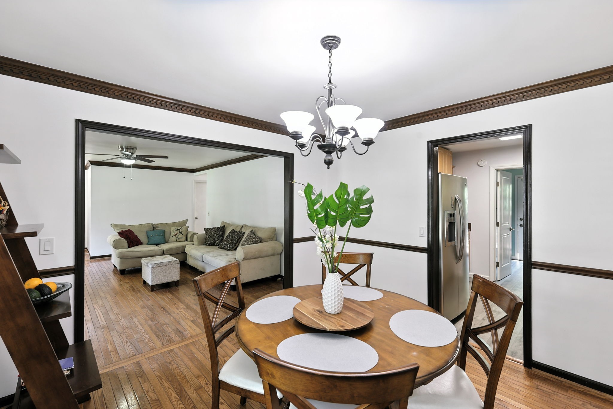 1121 Jacksons Valley Road Hermitage, TN 37076 - Photo 20 of 38 a view of a dining room with furniture and wooden floor