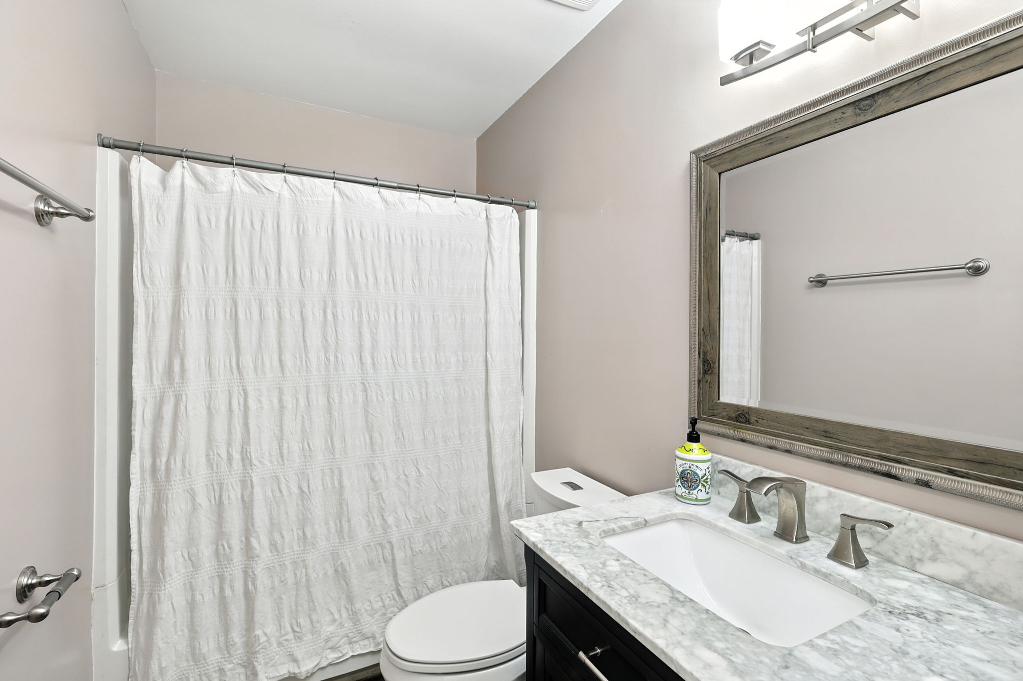 1121 Jacksons Valley Road Hermitage, TN 37076 - Photo 29 of 38 a bathroom with a granite countertop sink vanity mirror and toilet