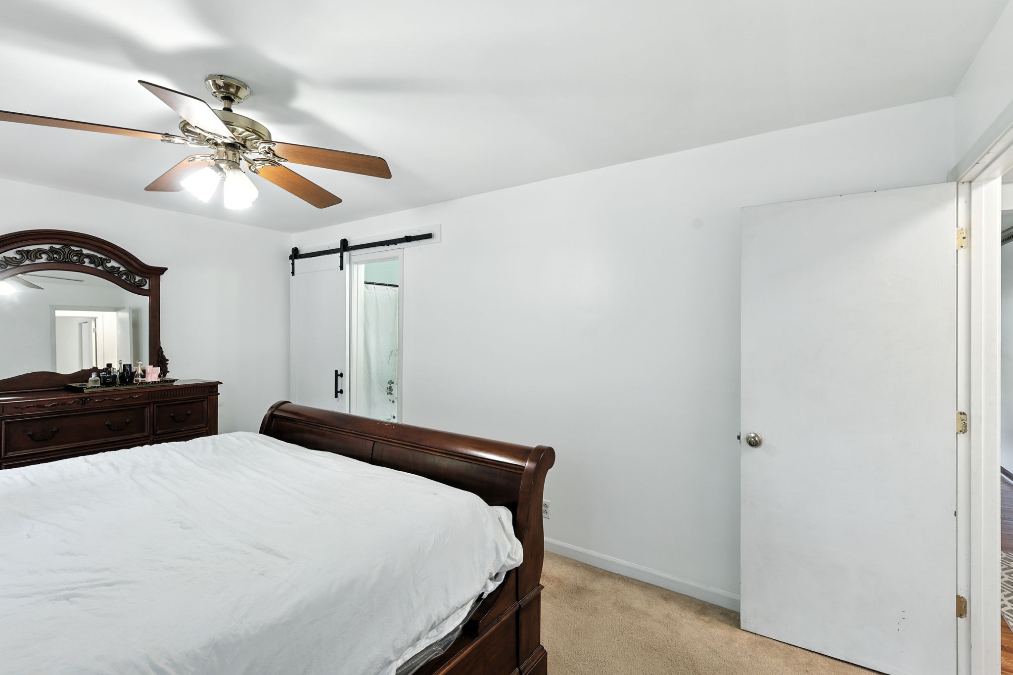 1121 Jacksons Valley Road Hermitage, TN 37076 - Photo 31 of 38 a bedroom with a bed and a chandelier