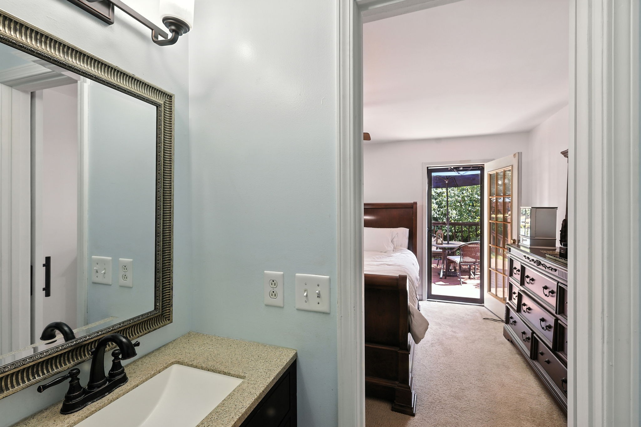 1121 Jacksons Valley Road Hermitage, TN 37076 - Photo 35 of 38 a bathroom with a sink a toilet and a mirror