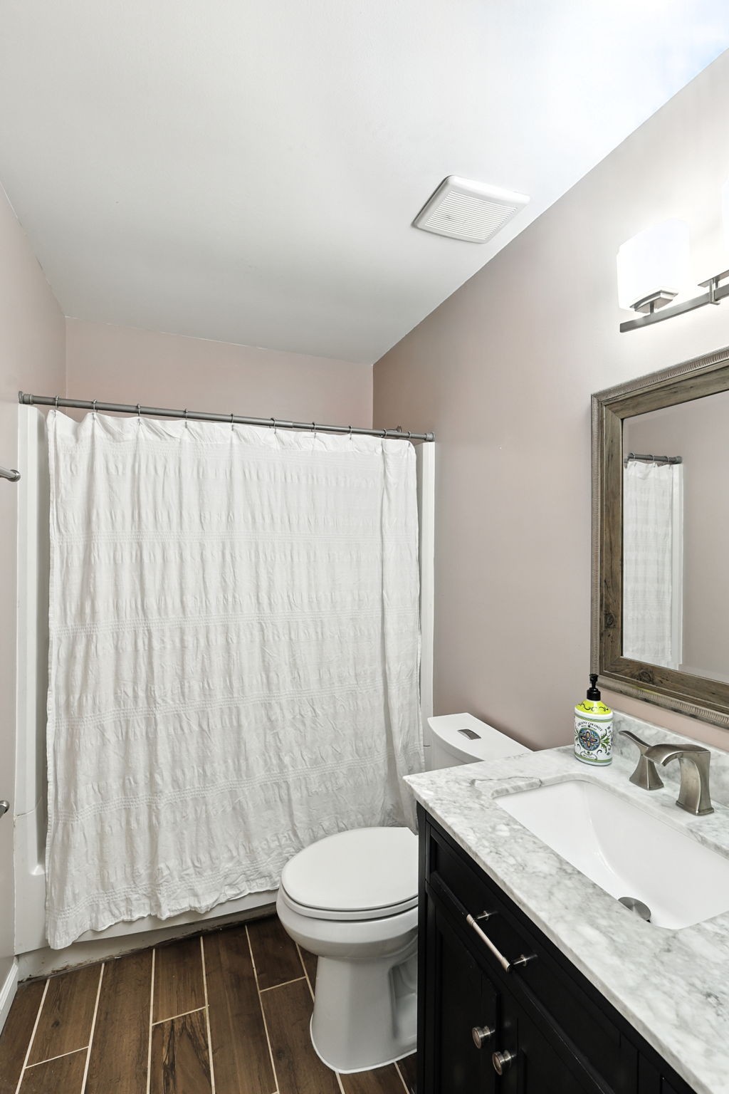 1121 Jacksons Valley Road Hermitage, TN 37076 - Photo 37 of 38 a bathroom with a granite countertop sink toilet and mirror