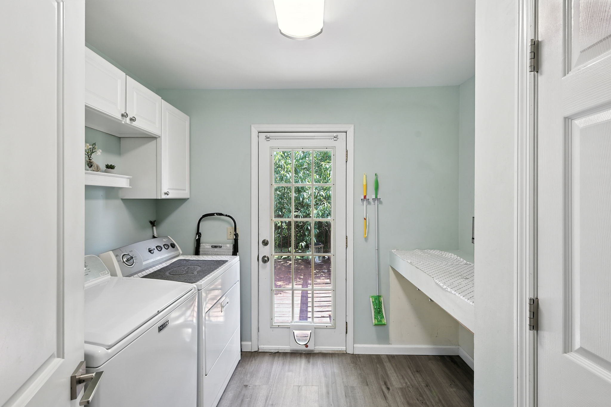 1121 Jacksons Valley Road Hermitage, TN 37076 - Photo 38 of 38 a kitchen with a refrigerator a sink and cabinets