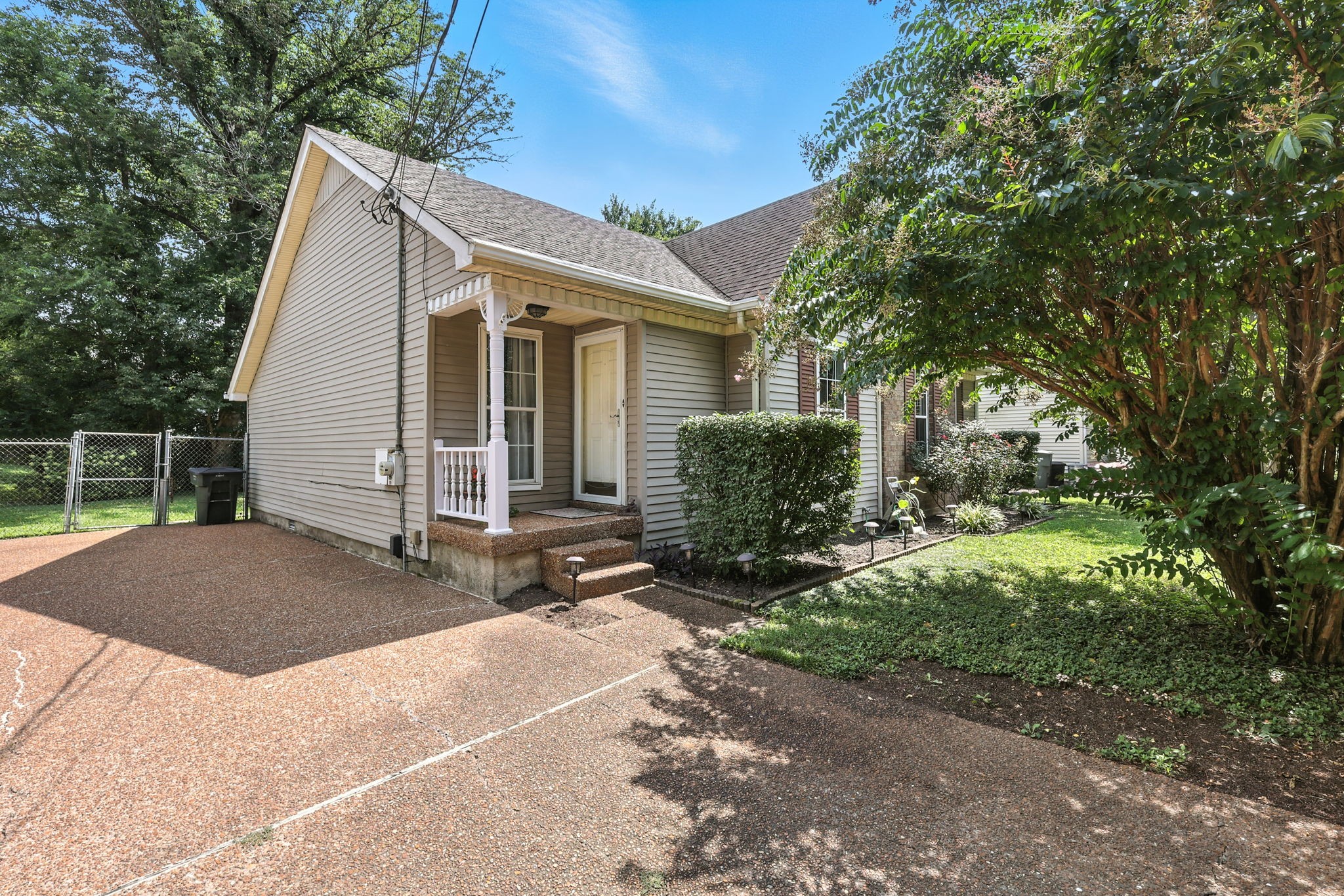 1121 Jacksons Valley Road Hermitage, TN 37076 - Photo 4 of 38 a view of a house with backyard and sitting area