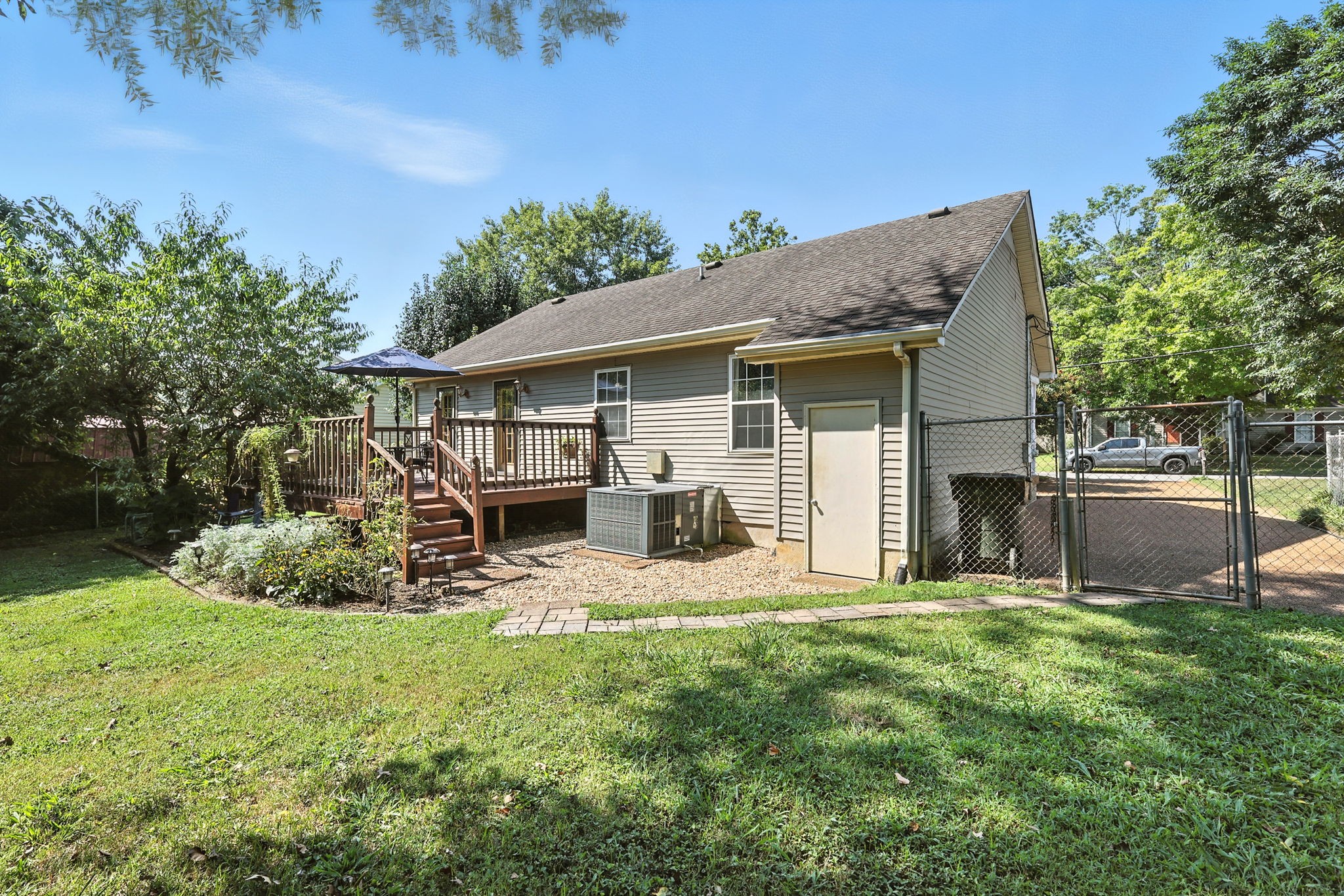 1121 Jacksons Valley Road Hermitage, TN 37076 - Photo 9 of 38 a view of a house with backyard and sitting area
