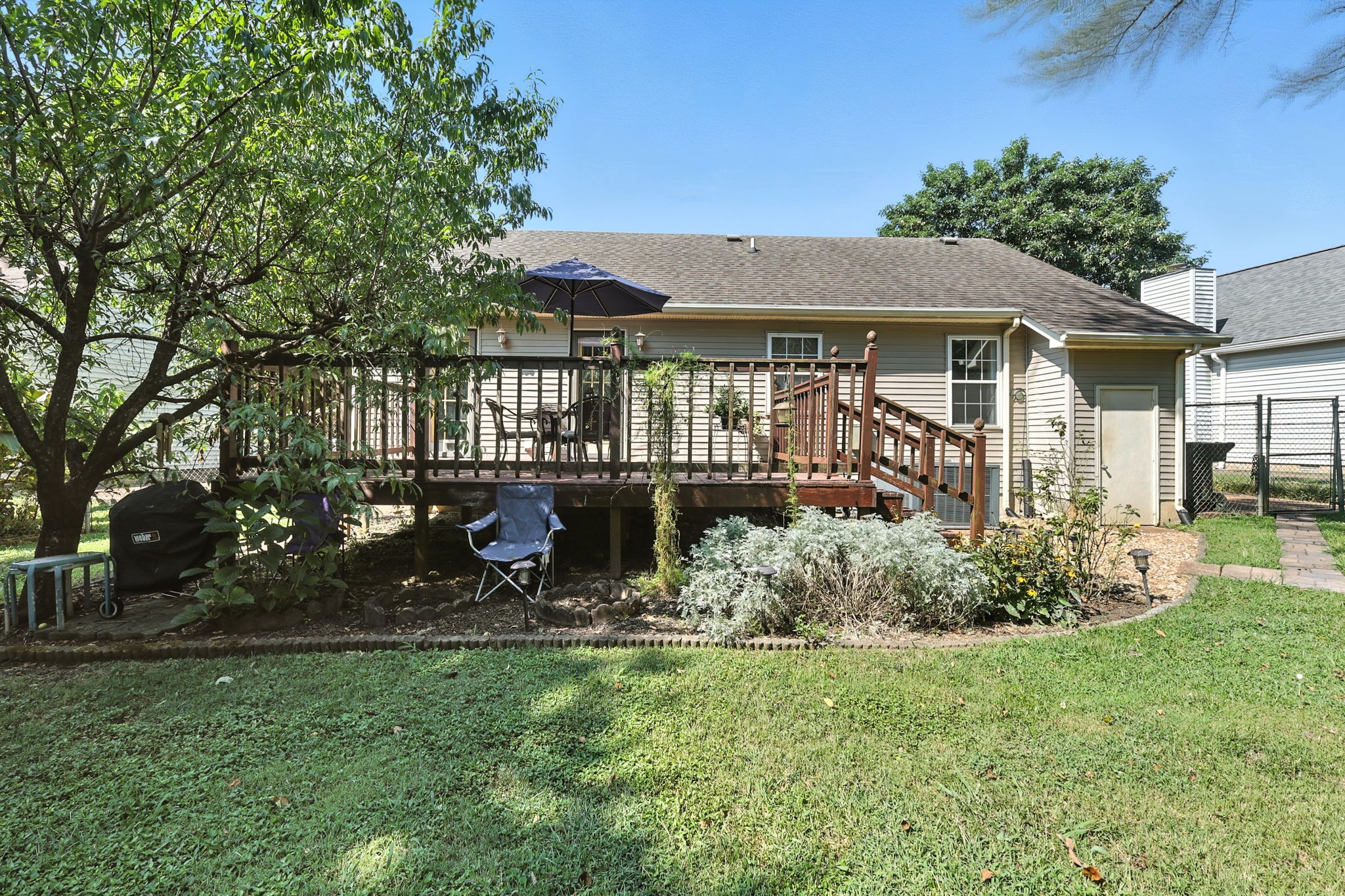 1121 Jacksons Valley Road Hermitage, TN 37076 - Photo 10 of 38 a view of a house with backyard and garden