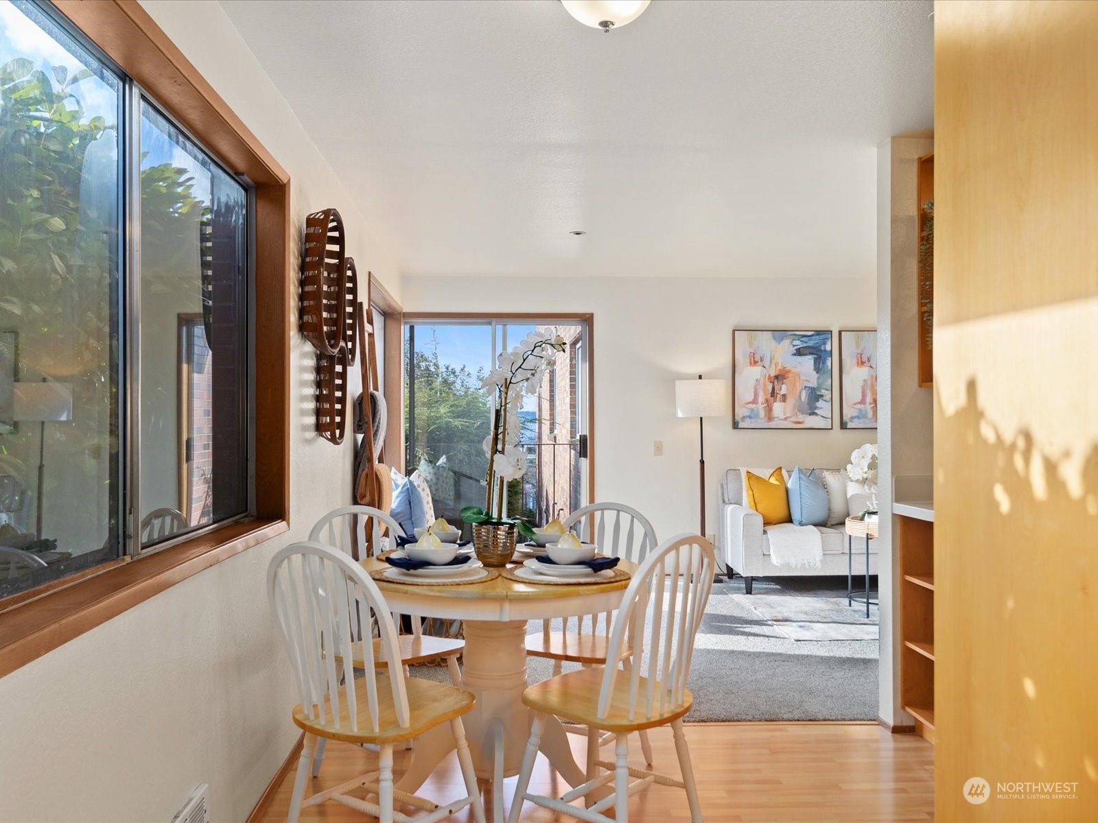 2619 Rucker Avenue, Unit 2 Everett, WA 98201 - Photo 14 of 39 a dining room with furniture and large windows