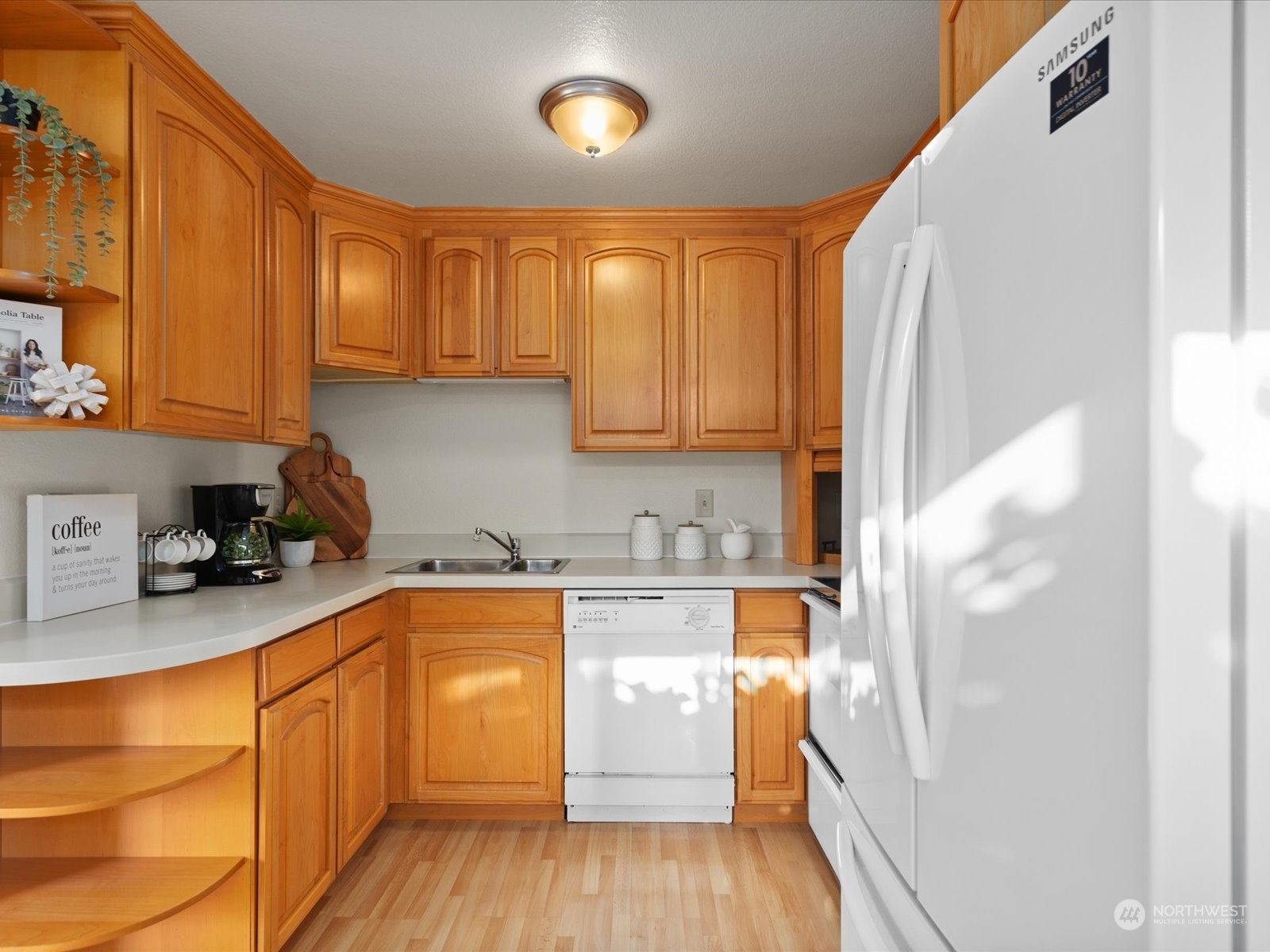 2619 Rucker Avenue, Unit 2 Everett, WA 98201 - Photo 15 of 39 a kitchen with a sink a stove and cabinets