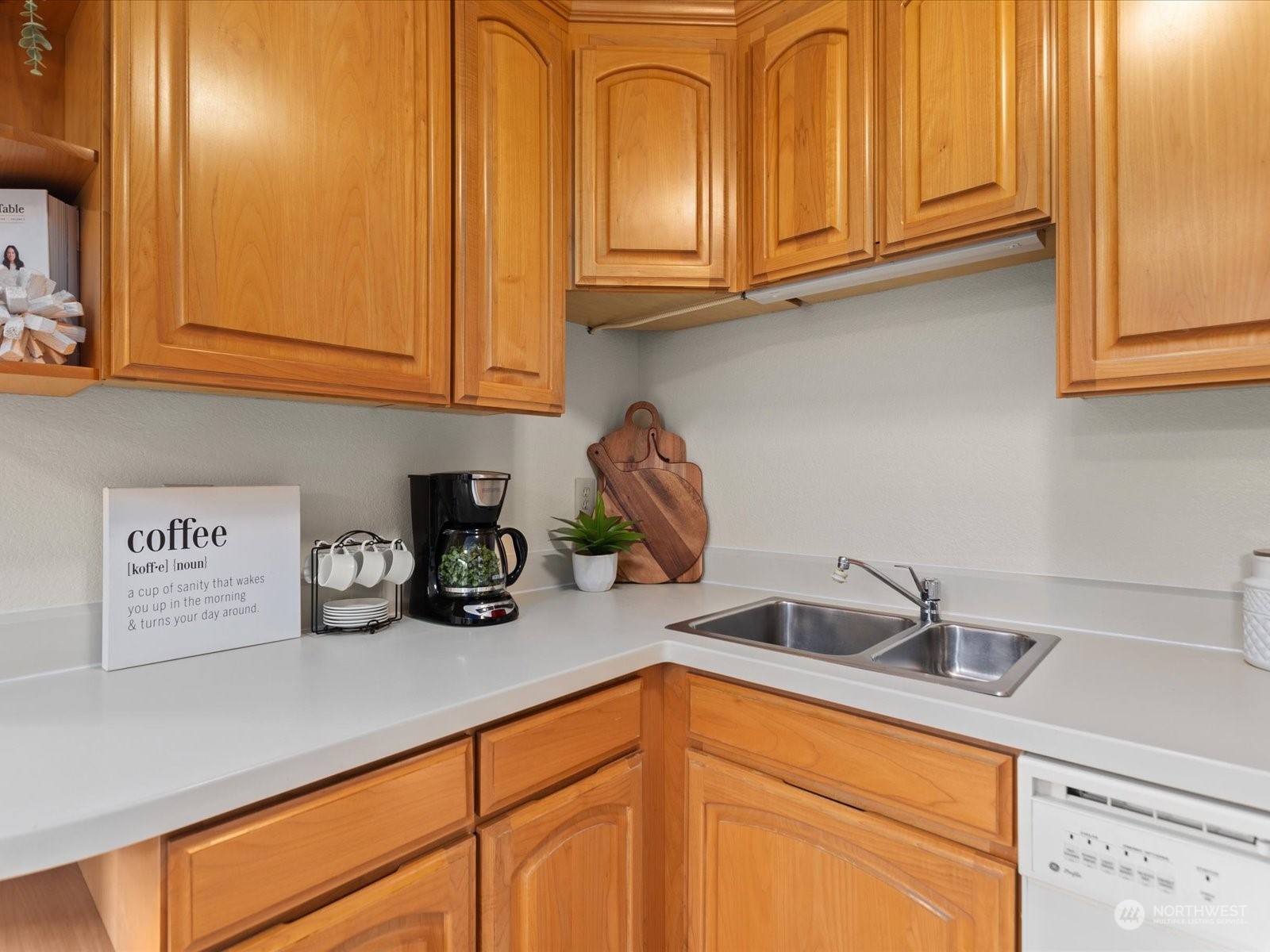 2619 Rucker Avenue, Unit 2 Everett, WA 98201 - Photo 16 of 39 a kitchen with stainless steel appliances granite countertop a sink and cabinets