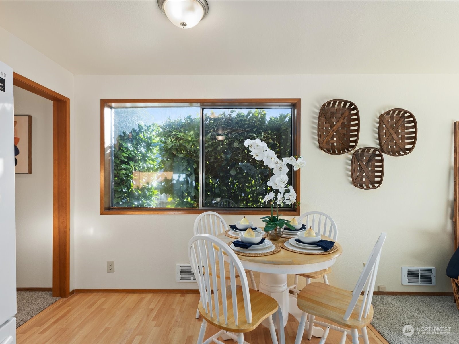 2619 Rucker Avenue, Unit 2 Everett, WA 98201 - Photo 18 of 39 a view of a dining room with furniture and chandelier