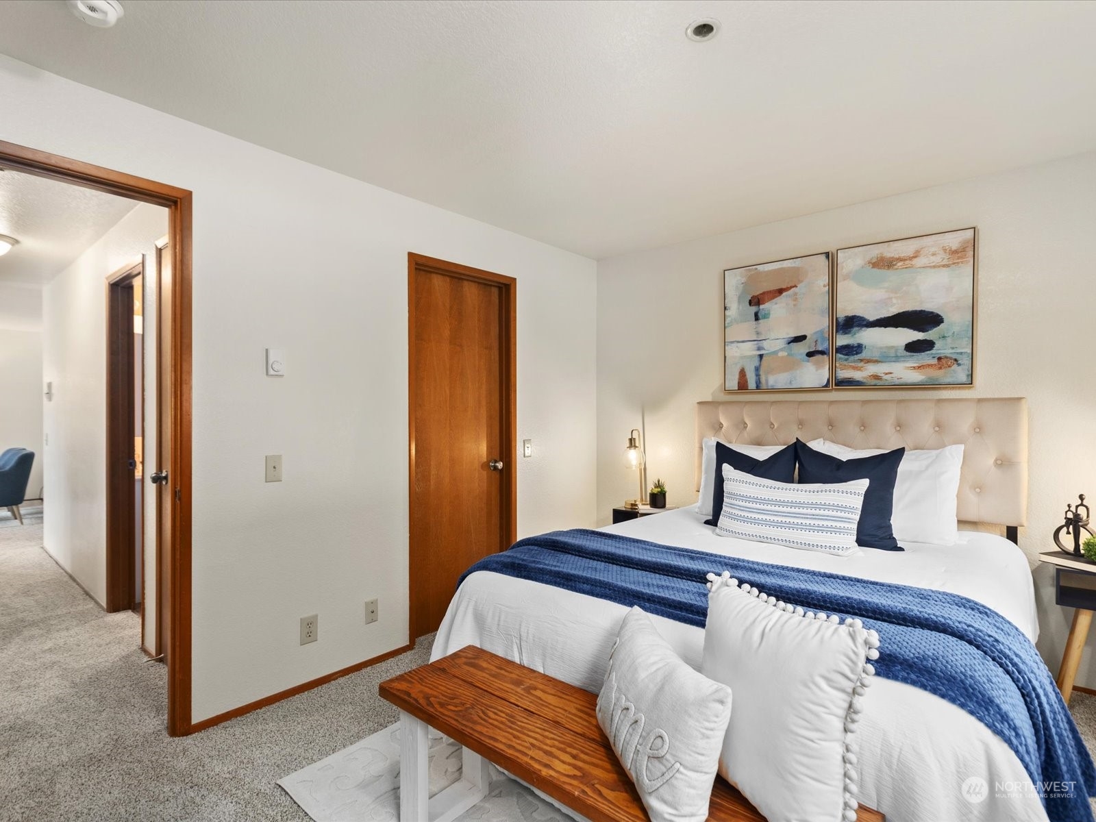 2619 Rucker Avenue, Unit 2 Everett, WA 98201 - Photo 26 of 39 a bedroom with a bed and painting on the wall