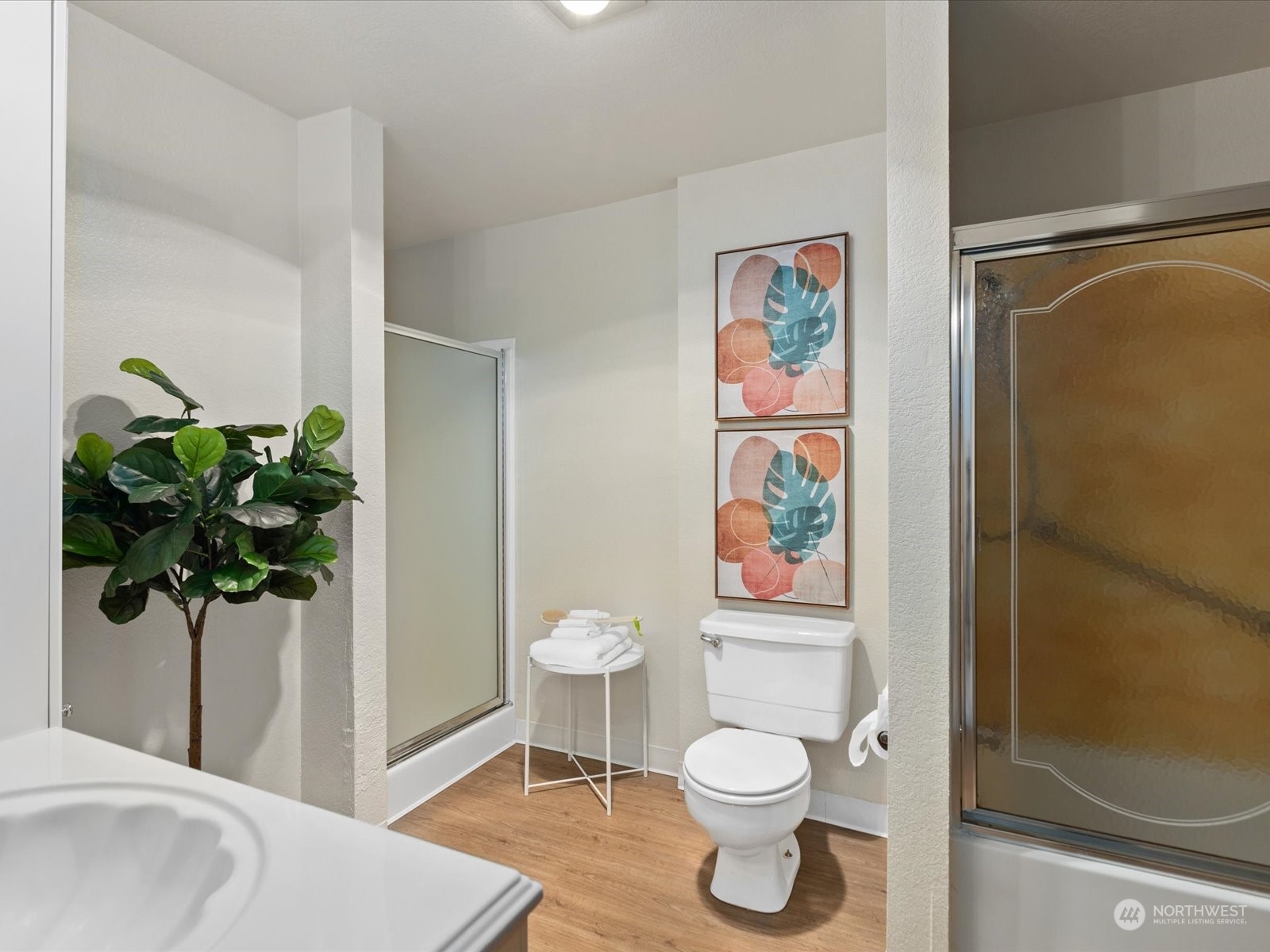 2619 Rucker Avenue, Unit 2 Everett, WA 98201 - Photo 28 of 39 a bathroom with a toilet sink and shower