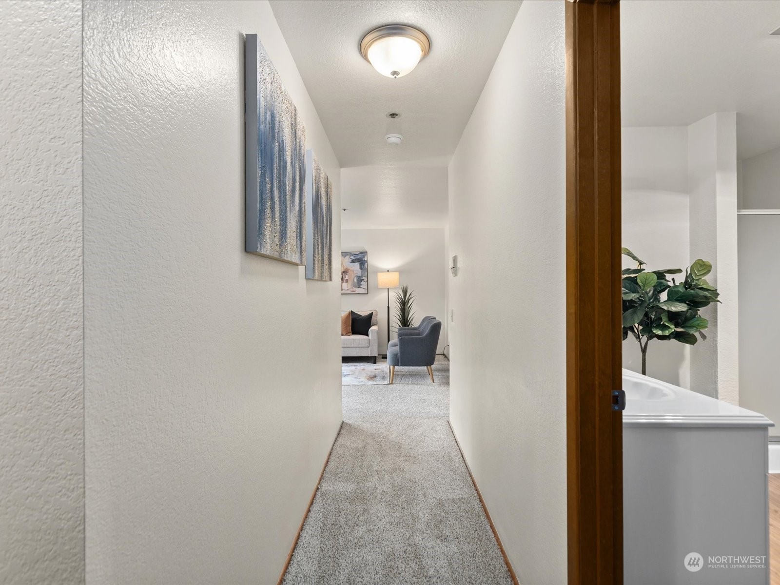 2619 Rucker Avenue, Unit 2 Everett, WA 98201 - Photo 30 of 39 a view of hallway with livingroom and furniture