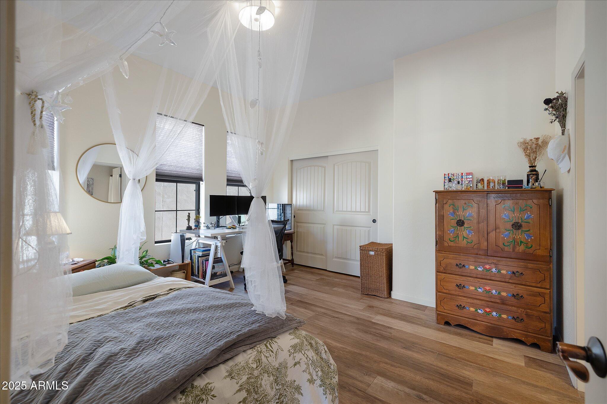 8536 East Inca Street Mesa, AZ 85207 - Photo 15 of 44 a bedroom with furniture and a mirror