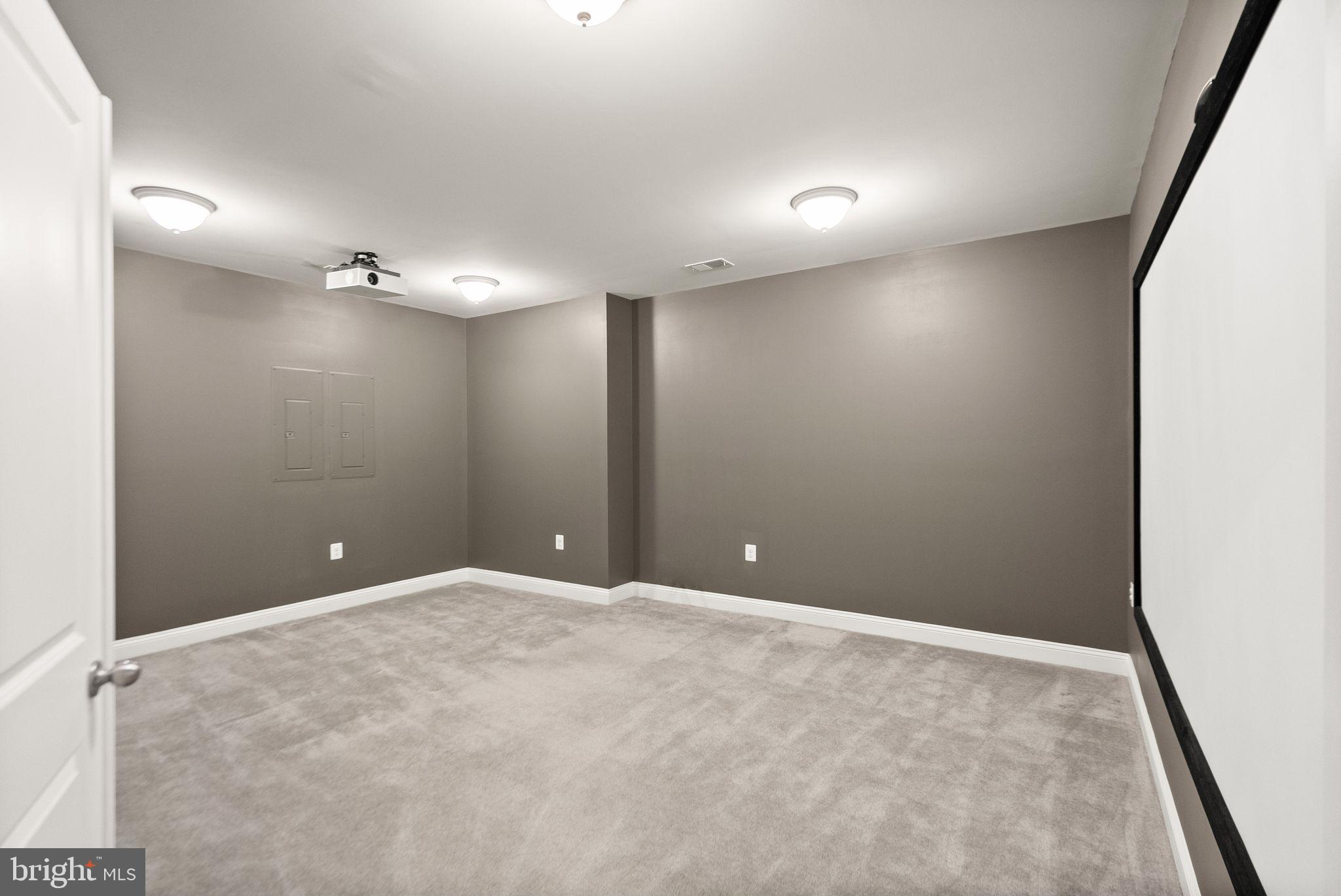 41841 Bloomfield Path Street Ashburn, VA 20148 - Photo 18 of 22 Media room with screen and projector