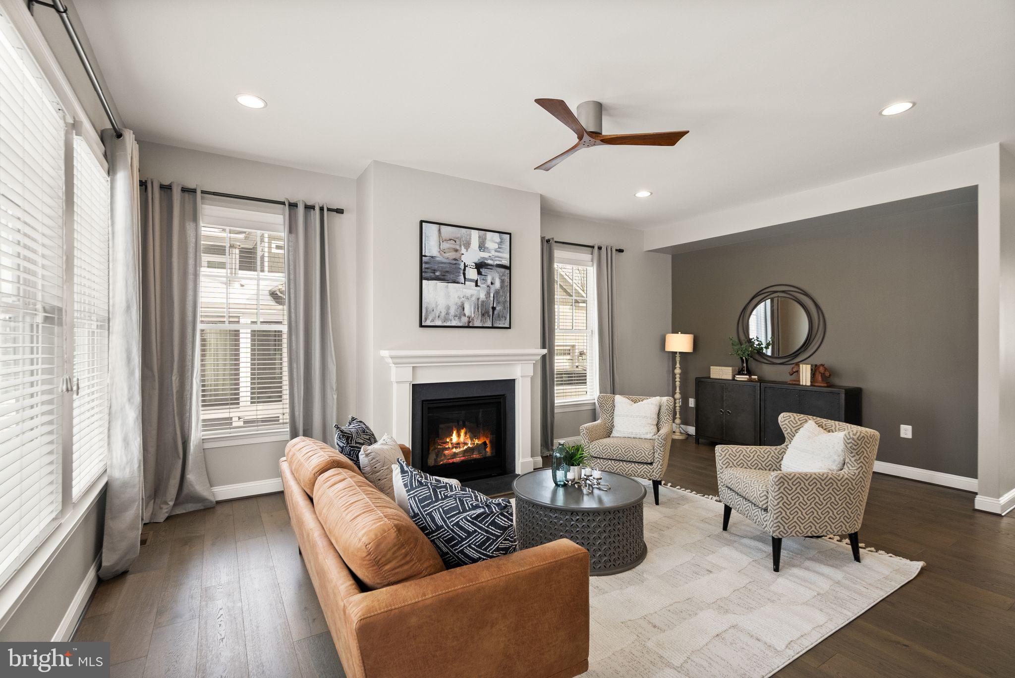 41841 Bloomfield Path Street Ashburn, VA 20148 - Photo 3 of 22 Family room with gas fireplace